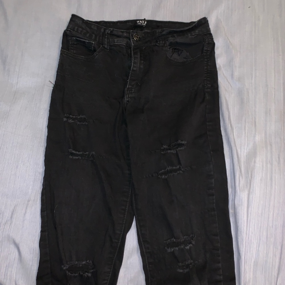 Black ankle length ripped skinny jeans